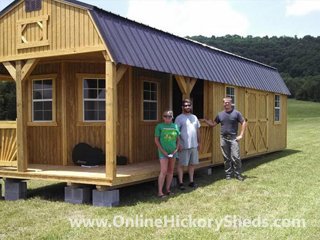 A family happy with their new Hickory Shed