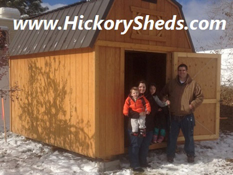 A family happy with their new Hickory Shed